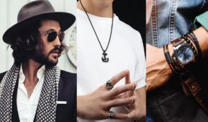 Men's accessories styling with jewelry, watch and sunglasses